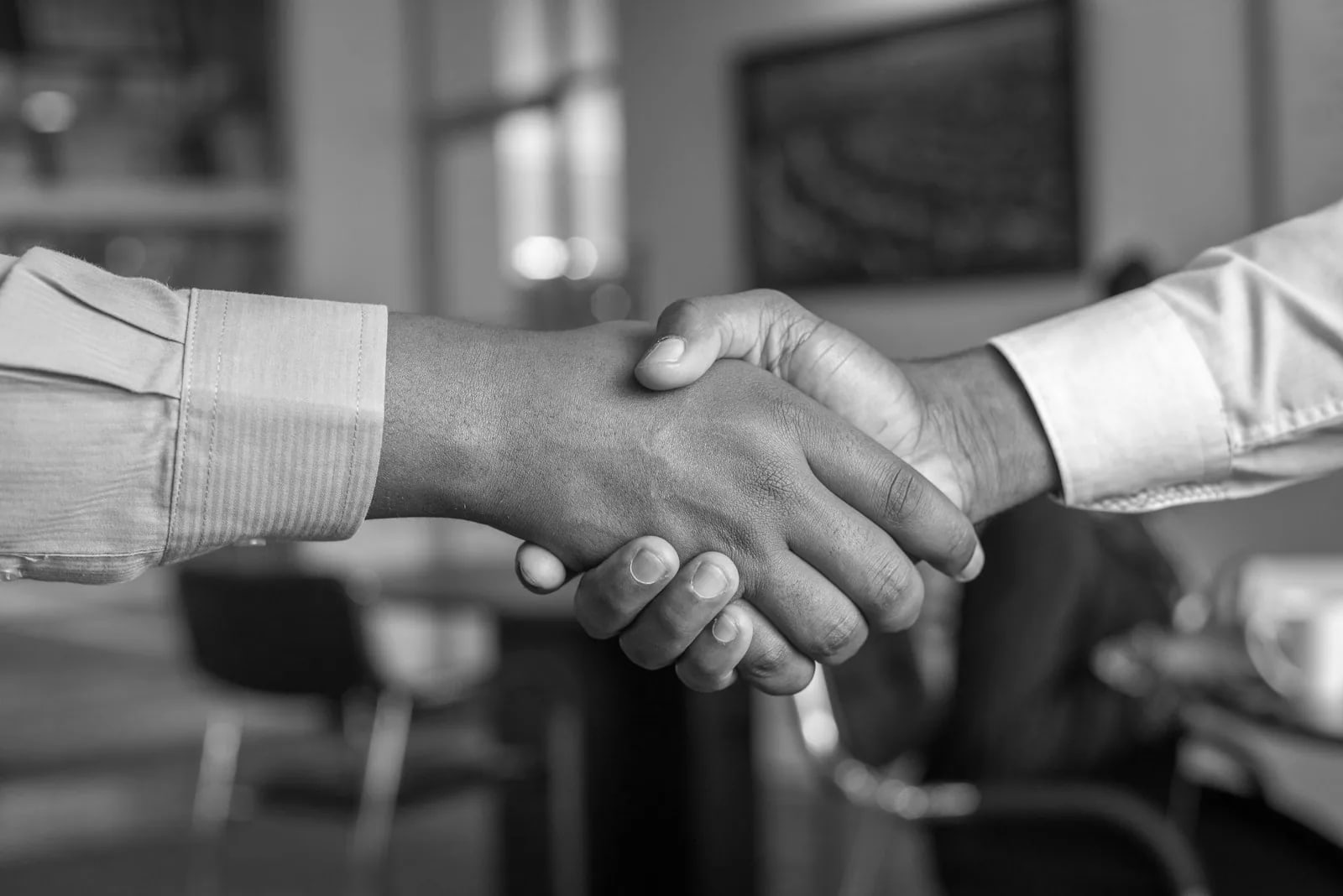 Handshake after a compliance briefing